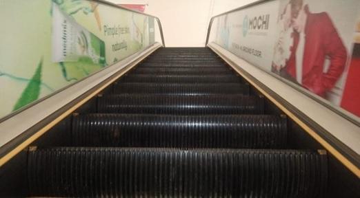 Escalator Branding 2 20 W x 2 H Ft Glass Inside Mall.jpg Escalator Branding 2 20 W x 2 H Ft Glass Inside Mall.jpg