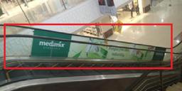 Escalator Branding 2 20 W x 2 H Ft Glass Inside Mall2.jpg