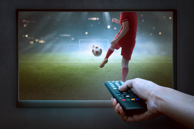 People Hands With Remote Watching Football Game 9083 2169
